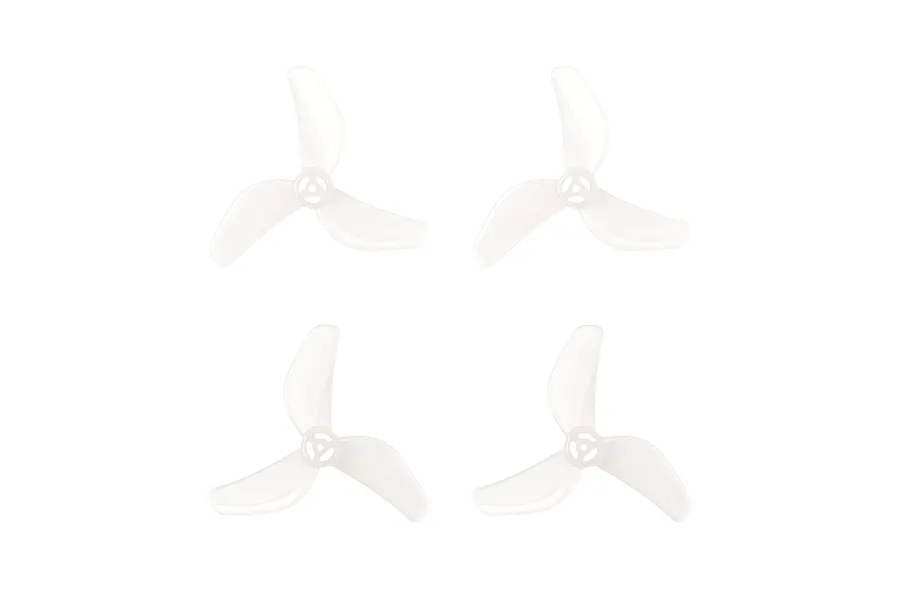 Four clear plastic three-blade propellers for RC drones arranged in a grid against a white background.