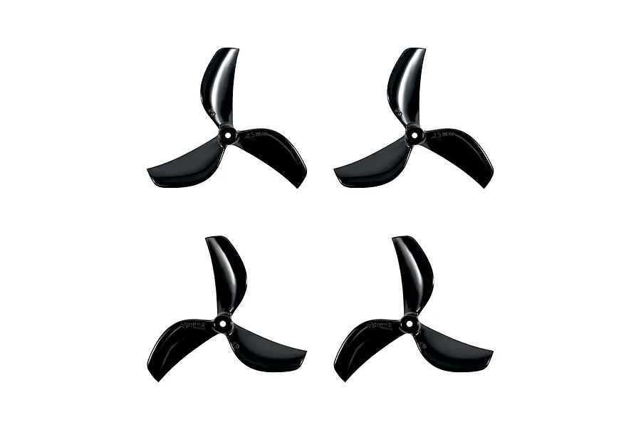 Four black 3-blade propellers for RC drones arranged in a grid on a white background.