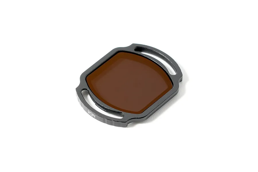 BetaFPV O4 Pro Camera ND8 filter with a dark brown lens and black frame, featuring mounting tabs on the sides.