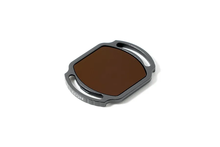 BetaFPV O4 Pro Camera ND32 filter in a dark grey frame with mounting tabs, isolated on a white background.