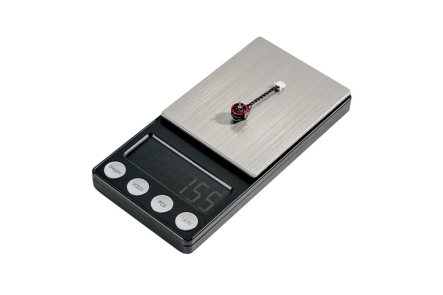 A single BetaFPV brushless motor sitting on a digital scale showing a weight measurement.