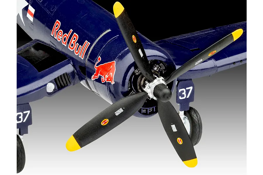 Close-up of a Revell 1/48 scale F4U-4 Corsair model aircraft painted in Red Bull livery with number 37 on the landing gear doors.