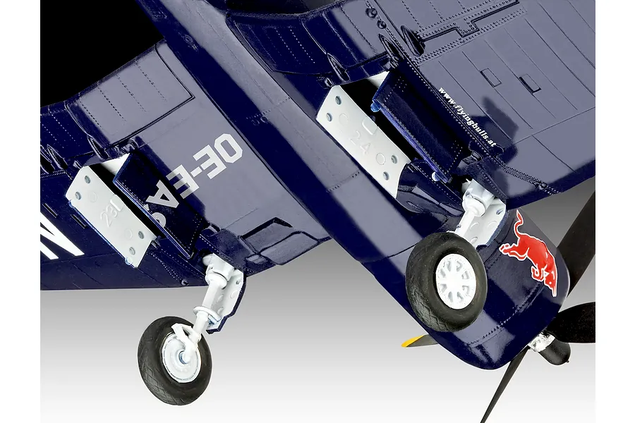 Close-up of the underside of a 1/48 scale F4U-4 Corsair model aircraft featuring Flying Bulls branding and Red Bull logo.