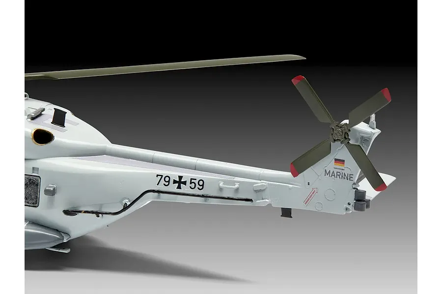 Close-up of the tail section of a finished Revell NH90 NFH Navy helicopter model kit, showing German Navy markings and tail rotor.