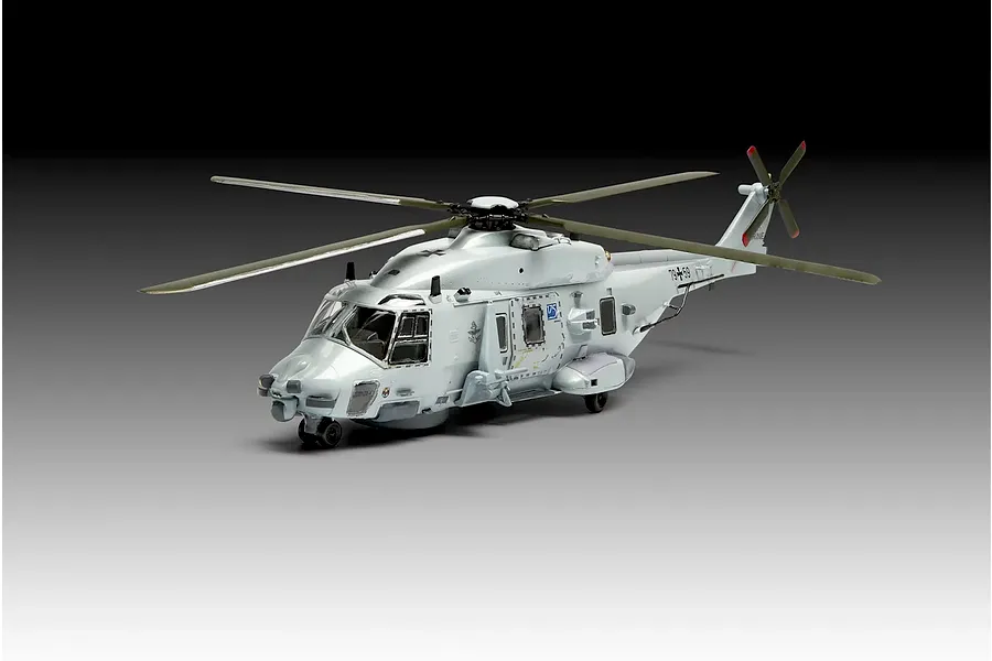 A 1/72 scale plastic model of a German Navy NH90 NFH helicopter, painted in light grey with detailed markings, shown against a gradient background.