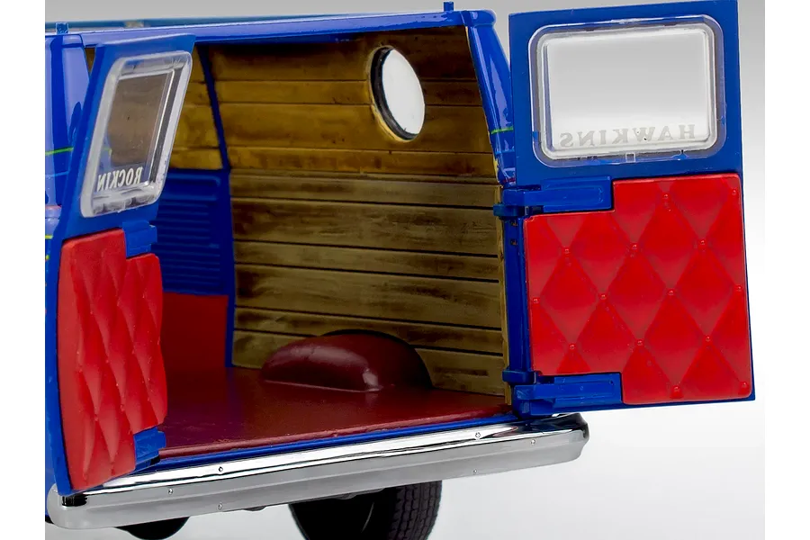 Rear view of a Revell 1/25 scale Stranger Things model van with open rear doors showing wood-paneled interior and red quilted door panels.