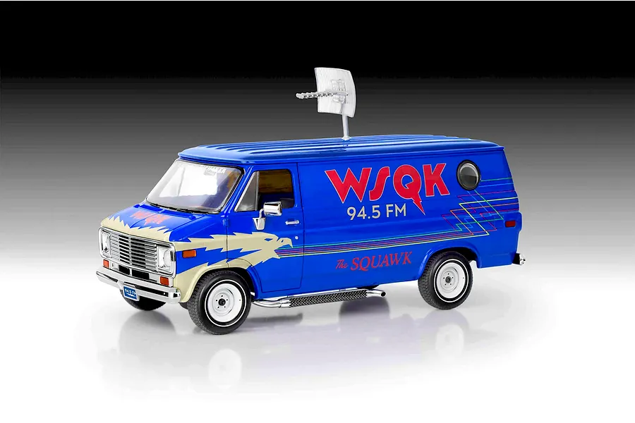 A 1/25 scale model of the blue WSQK 94.5 FM radio station van from Stranger Things, featuring a roof-mounted antenna and custom eagle graphics.