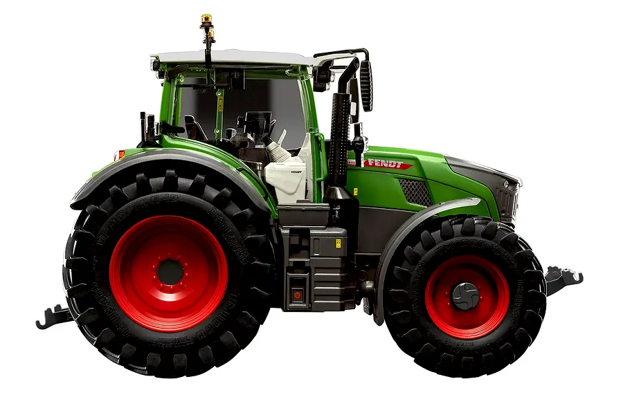 Side view of a 1/24 scale Revell Fendt 728 Vario tractor model, featuring green bodywork, red wheels, and black tires against a white background.