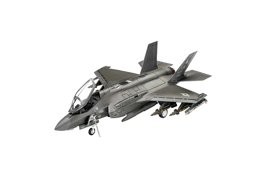 A fully assembled and painted 1/72 scale model of a Lockheed Martin F-35A Lightning II jet fighter, shown from a high-angle side view.