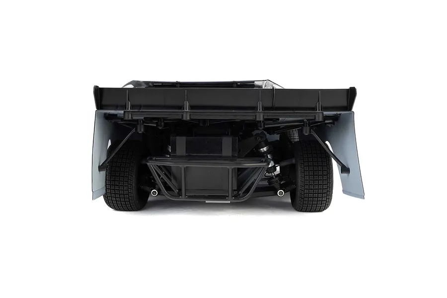 Rear view of the Losi 22S Dirt Late Model RC car showing the black rear bumper, spoiler, and treaded tires against a white background.