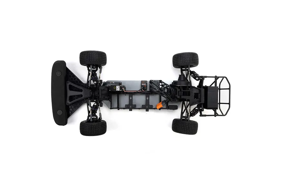 Top-down view of the Losi 22S RC car chassis showing the internal components, suspension, and wheels on a white background.