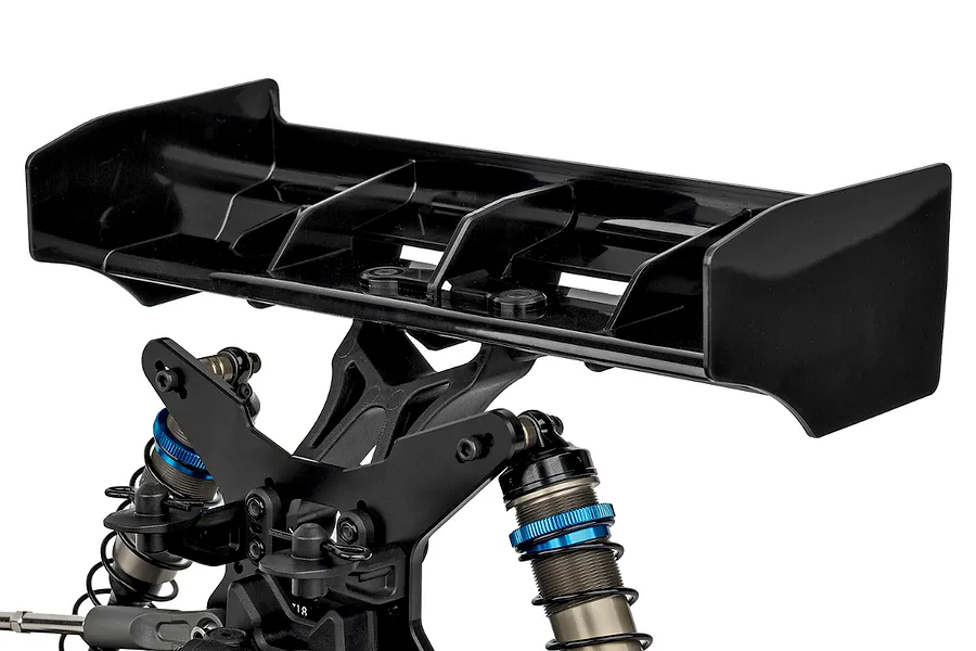 Close-up of the rear wing and shock tower assembly on a Team Associated RC8T4.2e RC truggy against a white background.