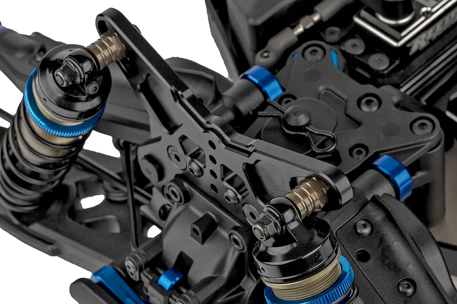 Close-up of the front suspension and shock tower assembly on a Team Associated RC8T4.2e RC truggy.