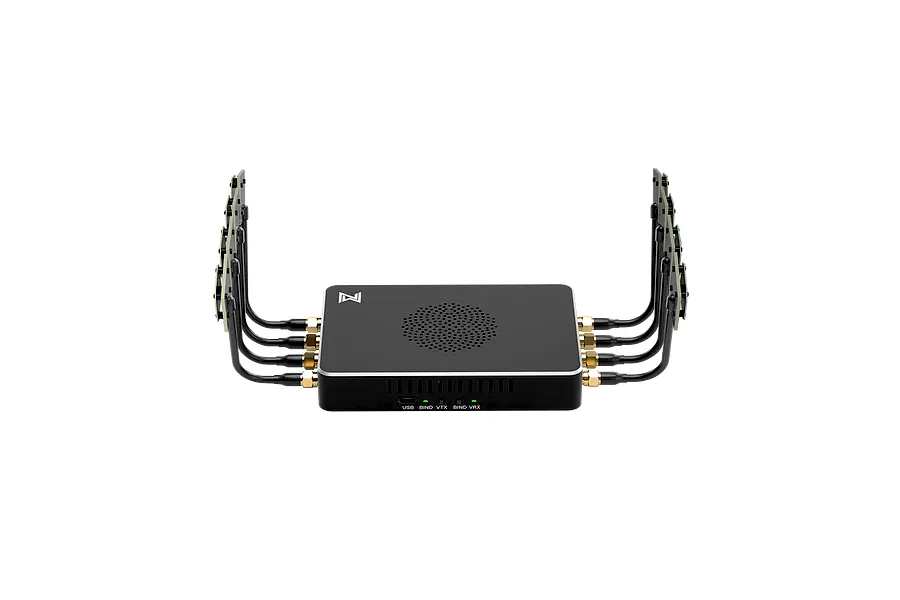 CaddxFPV Walksnail Avatar Video Repeater unit with multiple antenna connections and a black casing on a black background.