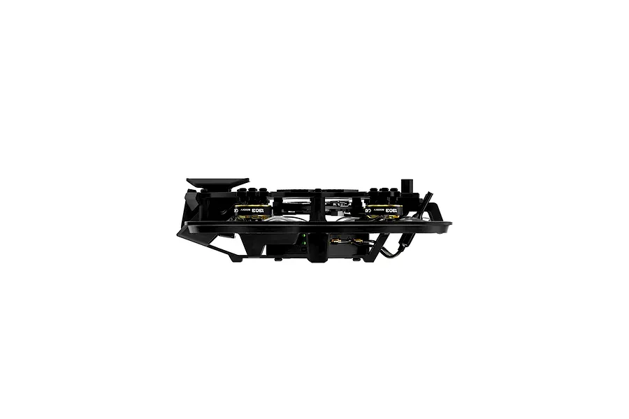 Side profile view of the CaddxFPV Gofilm 20 FPV drone, showing its black frame, motors, and internal components against a white background.