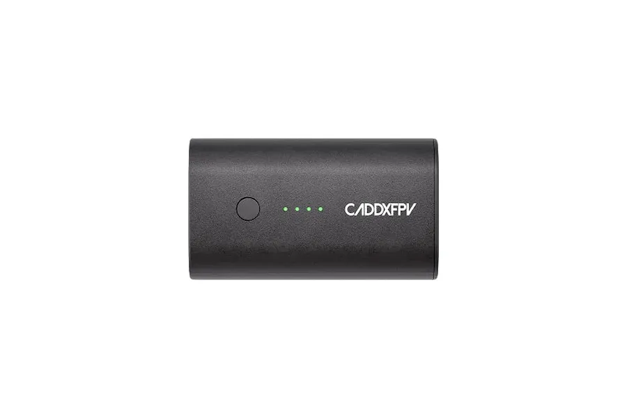 A black CaddxFPV hard case battery with a power button and four green LED charge indicator lights on the front.