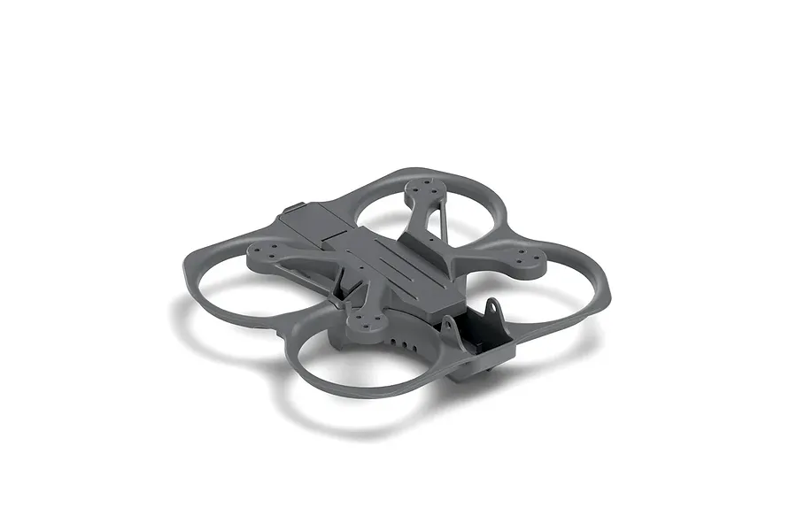 A grey plastic drone frame with integrated propeller guards, shown from a high-angle perspective against a white background.