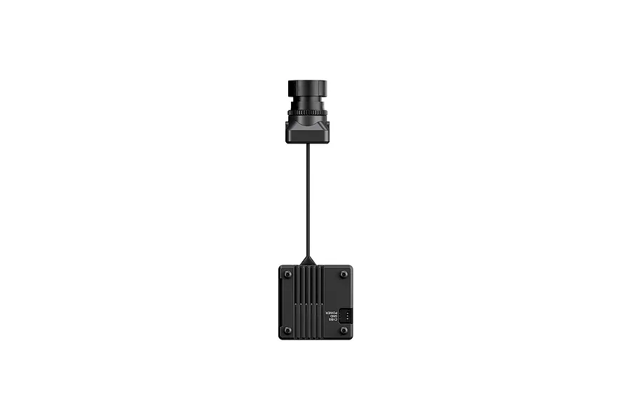 CaddxFPV Gazer analog FPV camera with a black lens module connected by a ribbon cable to a square, finned black electronic control board.