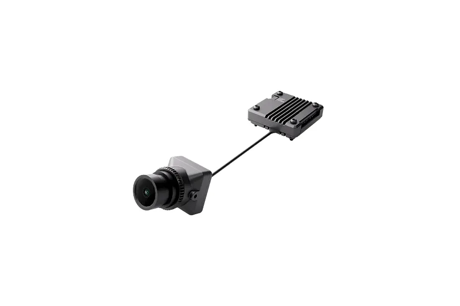 CaddxFPV Infra Red V2 analog FPV camera connected to a black AI processing box via a thin ribbon cable.