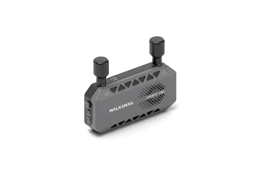 CaddxFPV Walksnail Ascent VRX receiver in grey with two black antennas, featuring ventilation grilles and control buttons on a white background.