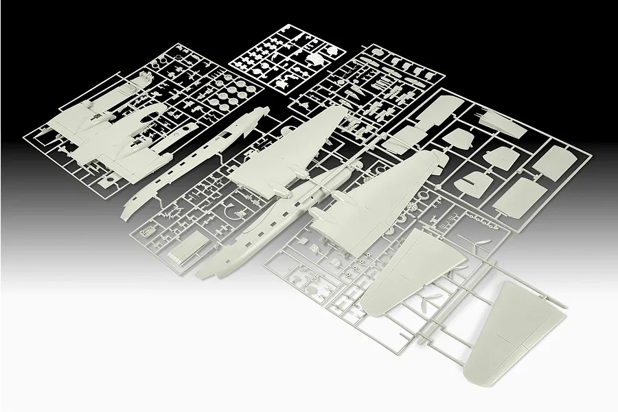 Multiple grey plastic model kit sprues for a Junkers Ju290 aircraft, laid out on a gradient background.