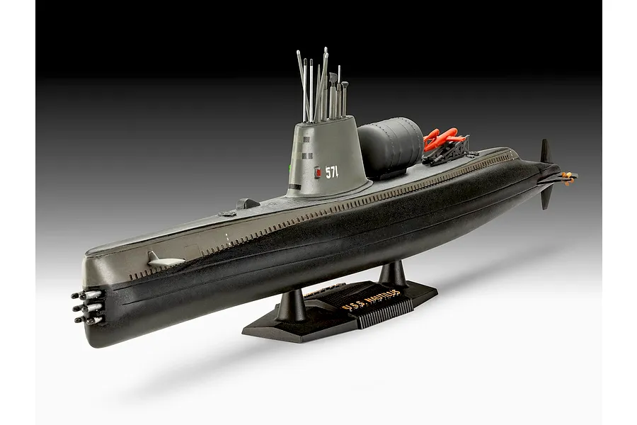 A completed Revell 1/305 scale plastic model kit of the USS Nautilus submarine, displayed on a black stand against a gradient grey background.