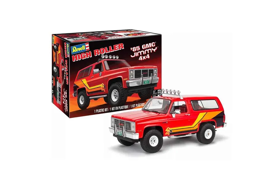 A Revell 1/25 scale '85 GMC Jimmy High Roller plastic model kit box and a fully assembled red model truck on a white background.
