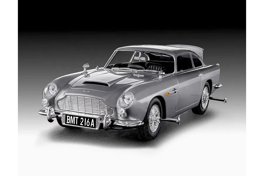 A 1/24 scale model of the silver Aston Martin DB5 from James Bond, featuring the iconic BMT 216A license plate and wheel-mounted tire slashers.