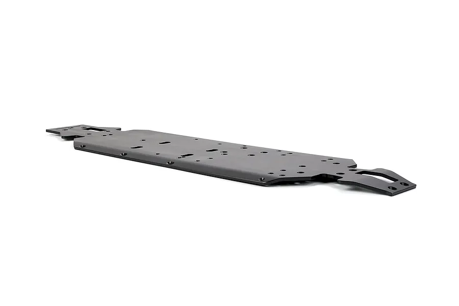 A black Rovan aluminium main chassis plate for an RC vehicle, shown from a low angle against a white background.