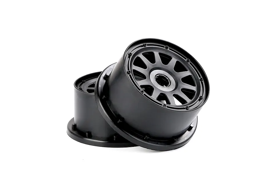 Two black Rovan 1/5 scale short course RC rear rims stacked against each other on a white background.