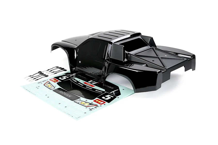 A black Rovan 1/5 scale 5SC short course RC truck body shell with a decal sheet and body clips on a white background.