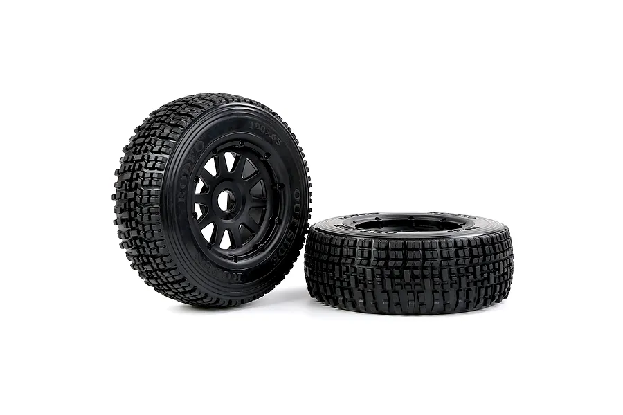 Two black 1/5 scale RC short course truck wheels with knobby tires on a white background.