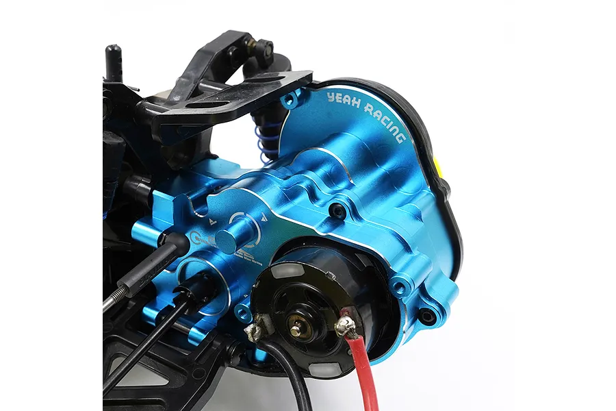 A blue anodized aluminium Yeah Racing complete gearbox installed on an RC car chassis.