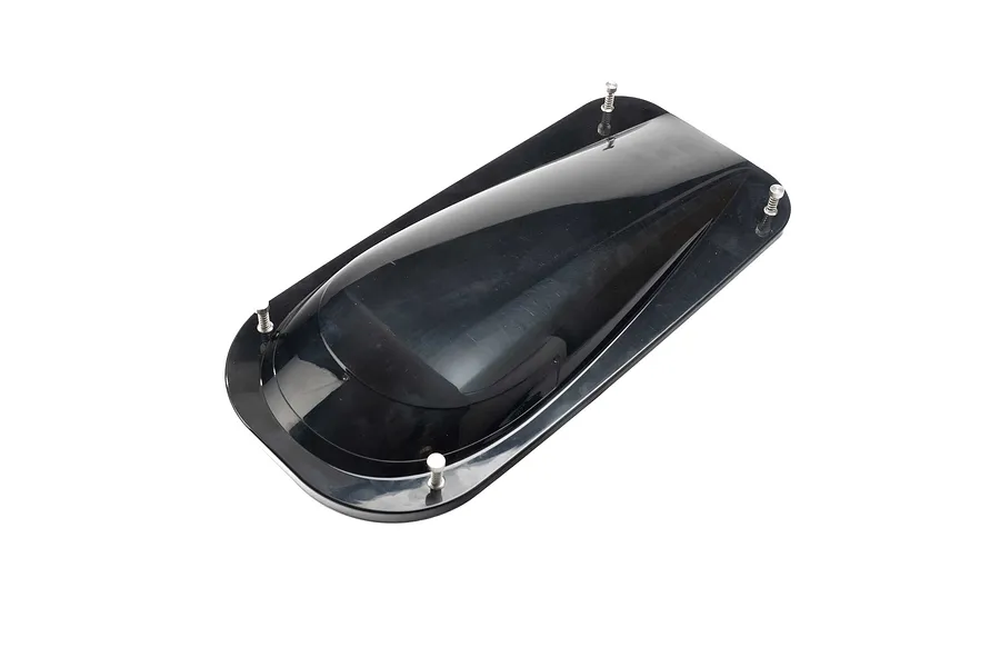 A black, glossy RC boat canopy with four silver mounting screws attached, isolated on a white background.