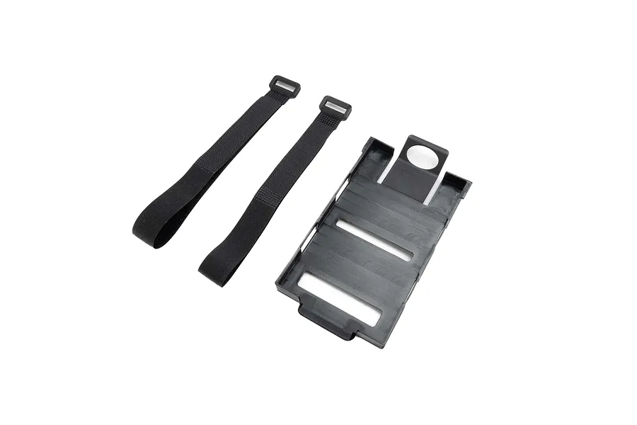A black plastic battery tray and two black hook-and-loop velcro straps for an RC boat.