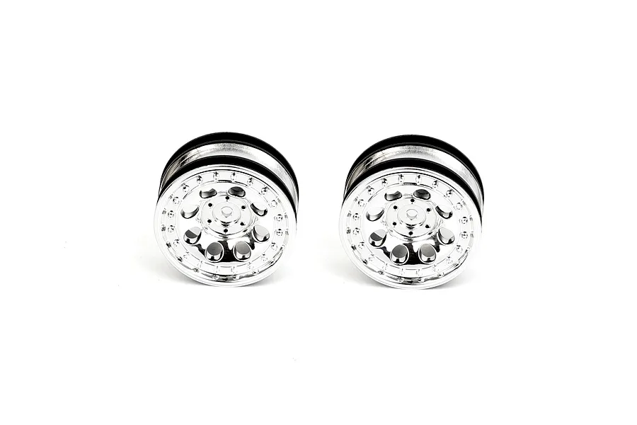Two electroplated silver RGT 1/10 scale crawler rims shown from a front-facing angle against a white background.