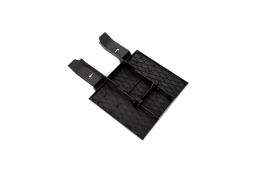 Black plastic flatbed trailer component for RGT RC vehicles, showing the underside with mounting points and structural ribbing.