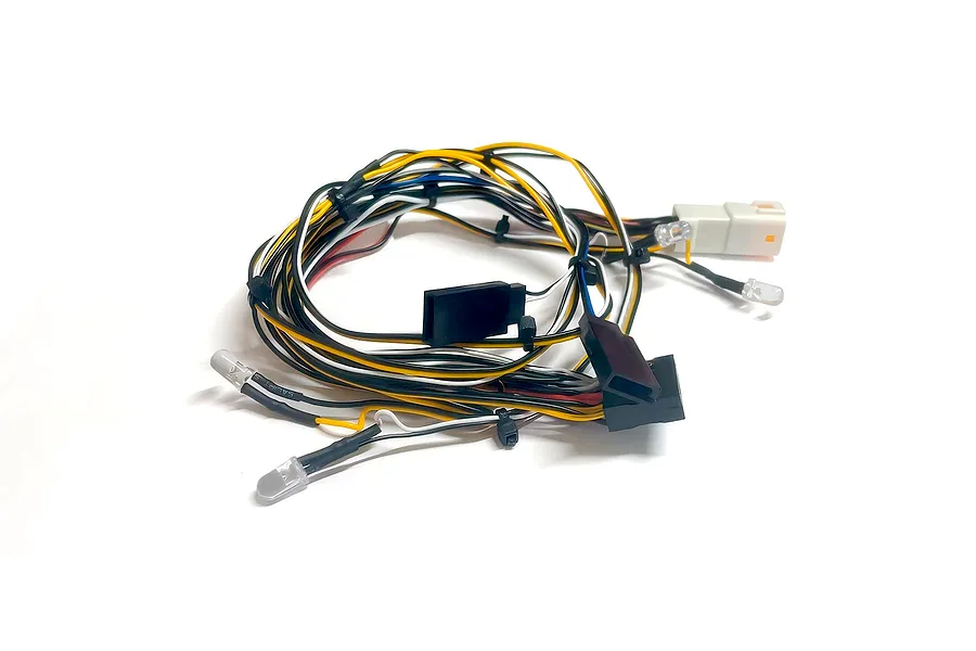 RGT RC front LED light set with wiring harness, connectors, and multiple LED bulbs against a white background.