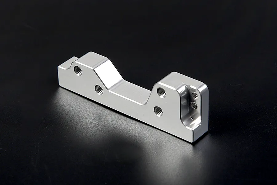 A silver Rovan aluminium engine mount for RC vehicles shown against a dark background.