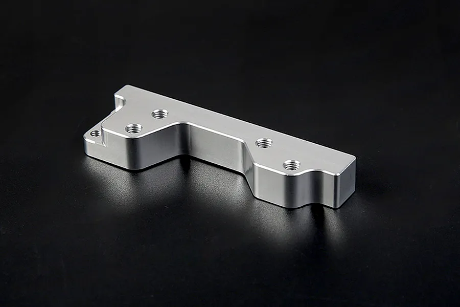 A silver Rovan aluminium engine mount for RC vehicles, featuring a machined metal design with multiple threaded mounting holes.