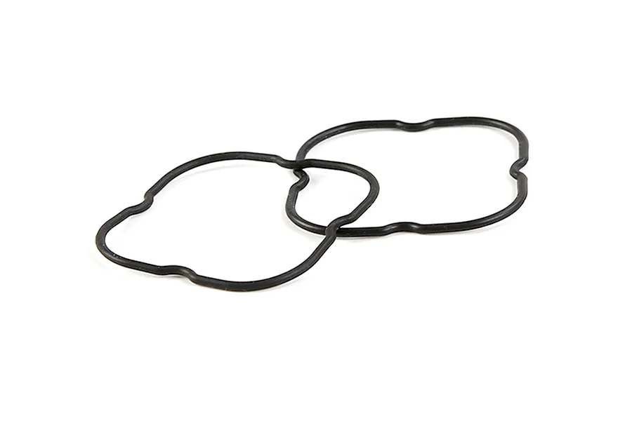 Two black rubber seals for Rovan RC differential parts against a white background.
