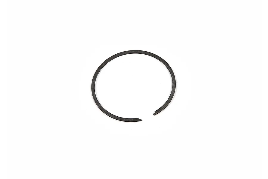 A single circular metal piston ring for an RC engine, shown against a plain white background.