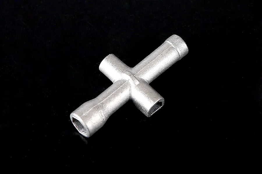 A silver-coloured Rovan aluminium cross wrench tool for RC vehicles, shown against a plain black background.