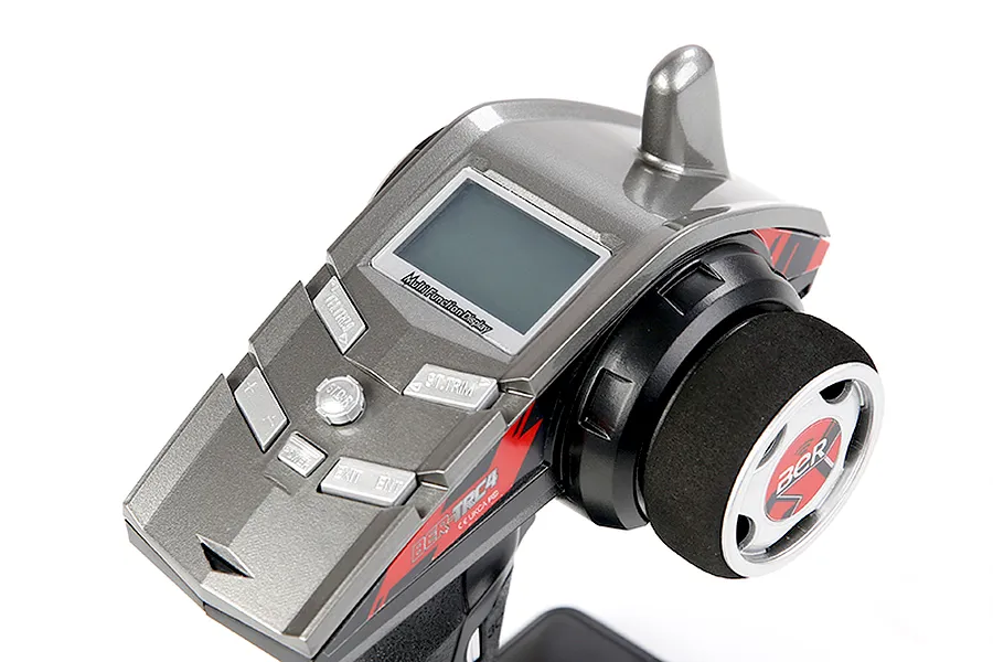 Close-up of a Rovan BER 2.4Ghz RC transmitter showing the metallic grey body, steering wheel with foam grip, and LCD screen.