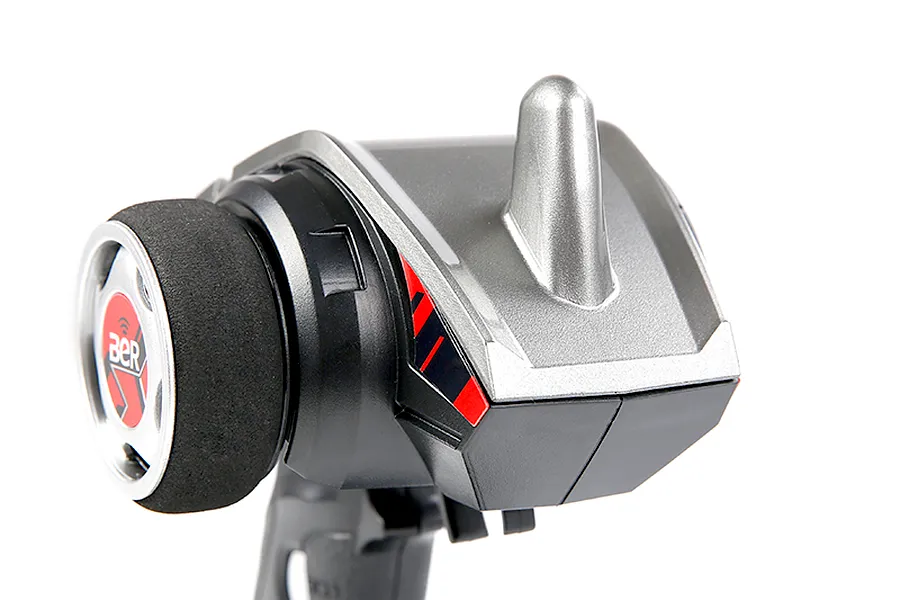 Close-up of the steering wheel and top section of a Rovan BER 2.4Ghz RC transmitter against a white background.