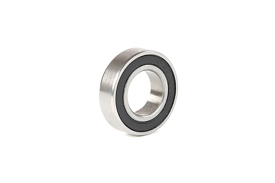 A single rubber shielded ball bearing for RC vehicles, shown at an angle against a white background.