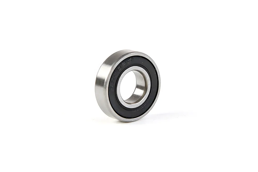 A single Rovan rubber shielded ball bearing shown at an angle against a white background.
