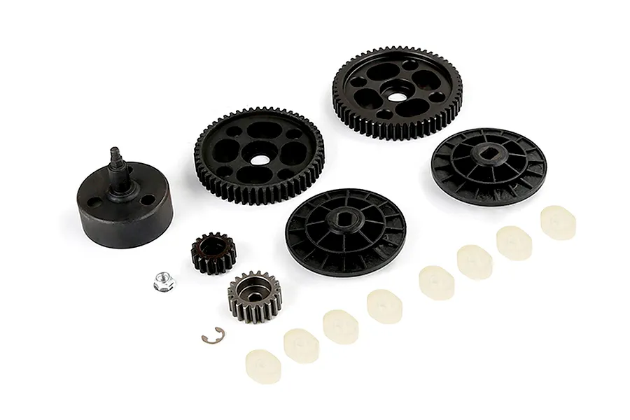 A set of Rovan RC drivetrain spare parts including a clutch bell, spur gears, pinion gears, and small plastic spacers on a white background.