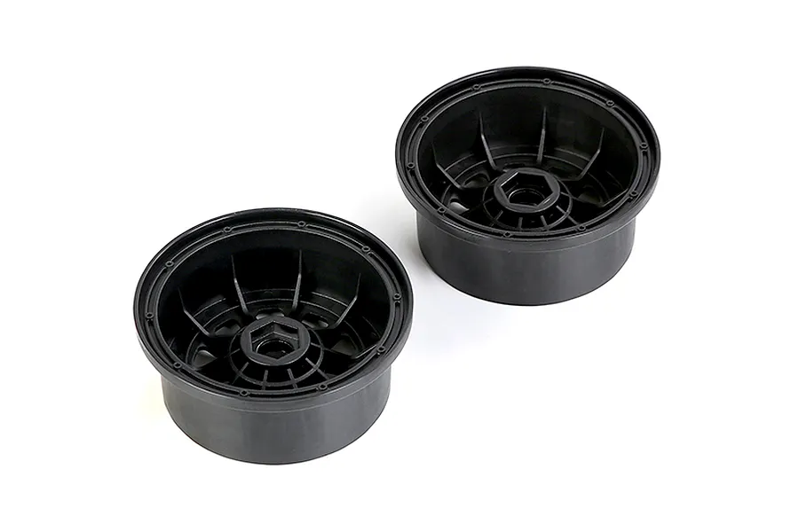 Two black plastic RC wheel hubs shown from an angled perspective against a white background.