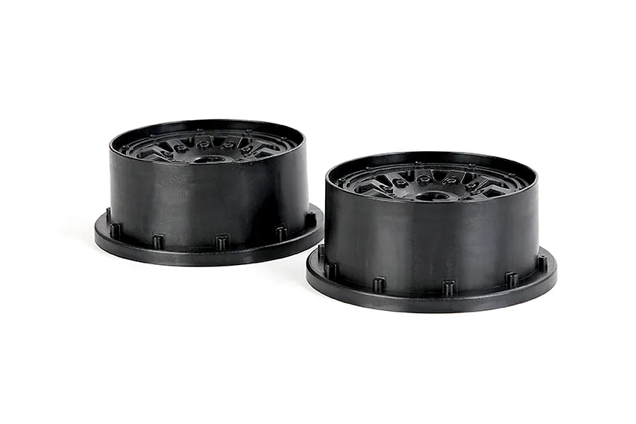 Two black plastic RC car wheel hubs or rims shown from a side-angle perspective against a white background.